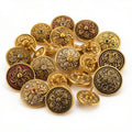 Decorative golden metallic fancy buttons with floral engravings